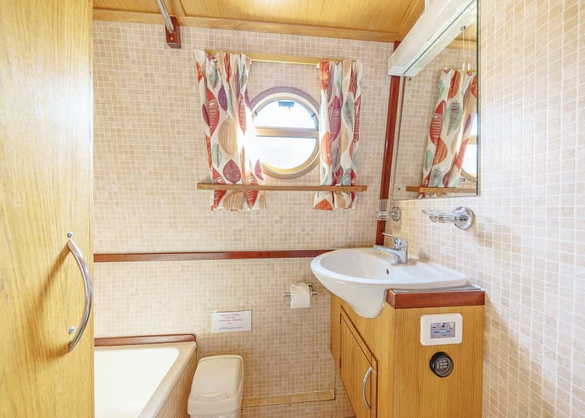 Genuine example Elite bathroom with basin and mirror; the bathroom shown is not Imogen’s.