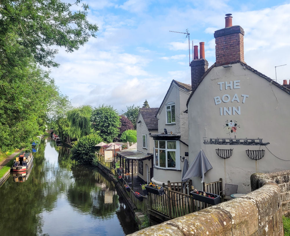 A traditional canalside pub beside the water.